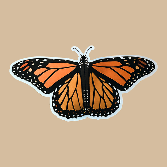 Monarch butterfly sticker with orange spots, all on a beige background.